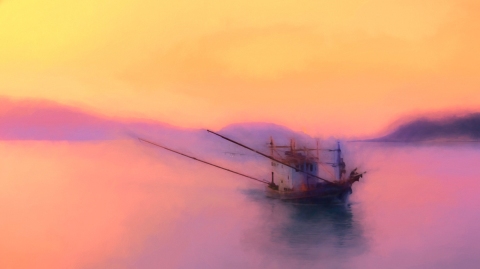 A fishing trawler returns home to Rawai in the early morning mist with the night's catch